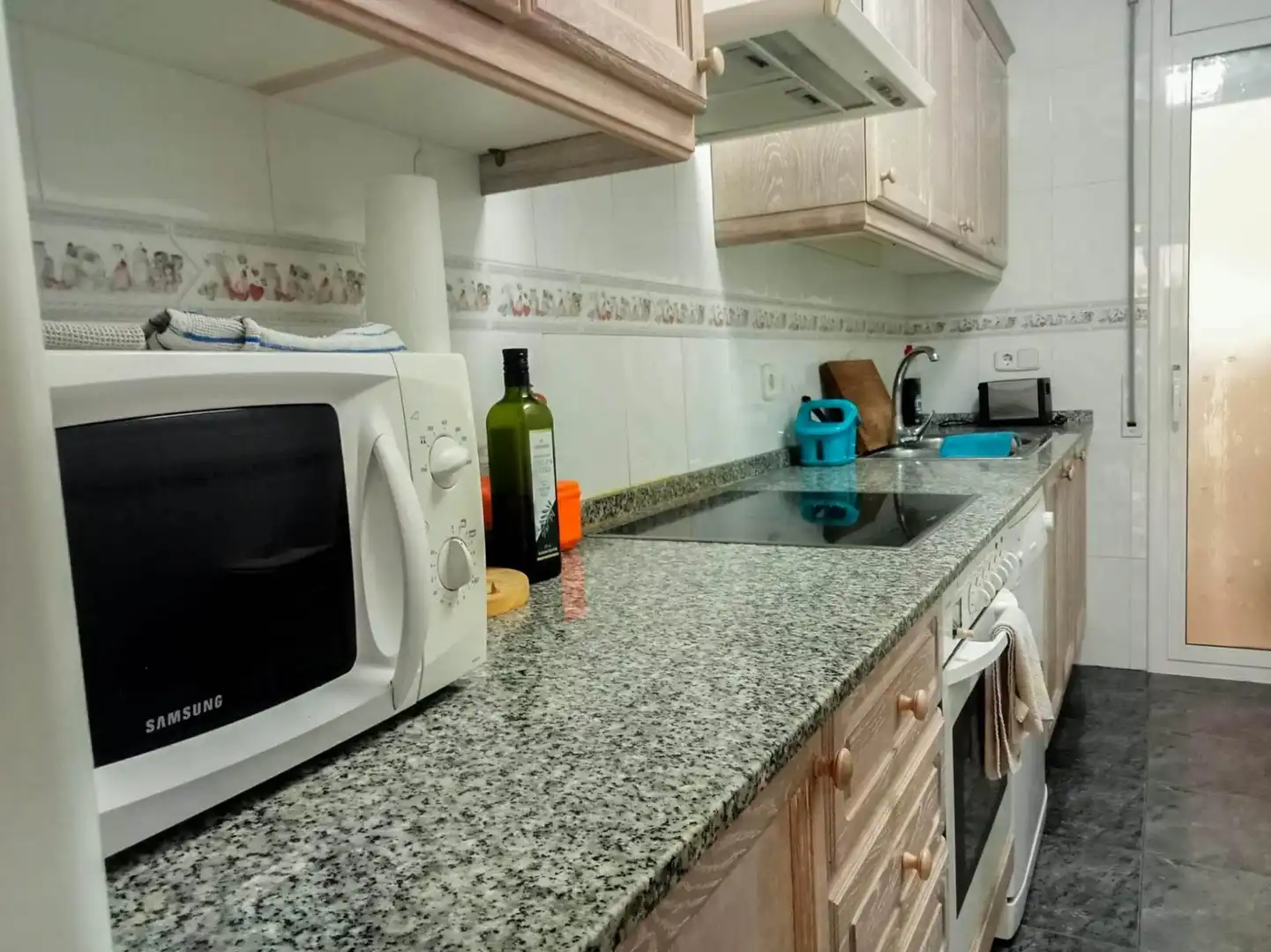 Kitchen of Flat for sale in Cunit  with Air Conditioner, Terrace and Community pool
