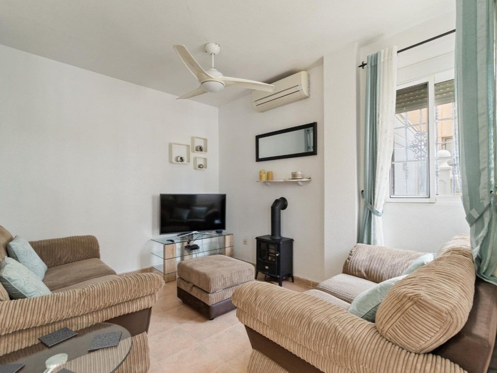 Living room of Single-family semi-detached for sale in Torrevieja  with Air Conditioner, Private garden and Terrace