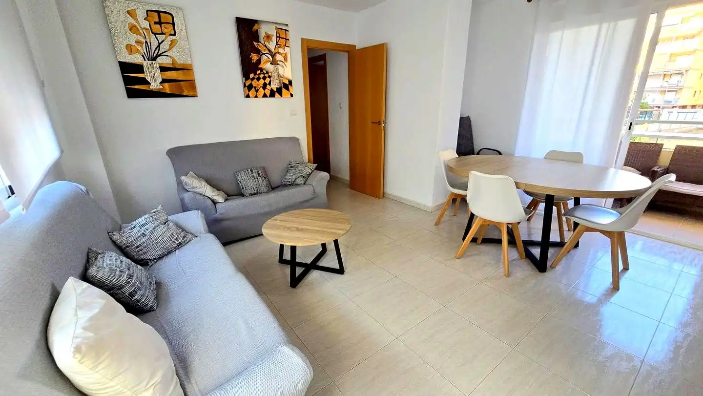 Sala de estar de Apartamento de alquiler en Gandia con Aire acondicionado, Terraza y Piscina comunitaria