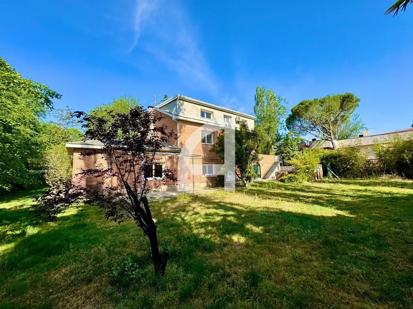 Vista exterior de Casa o chalet en venta en Villanueva de la Cañada con Aire acondicionado, Calefacción y Jardín privado