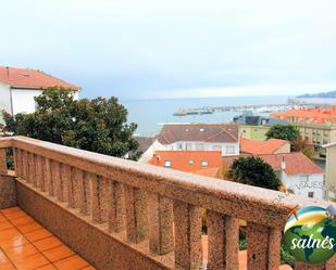 Vista exterior de Casa o xalet de lloguer en Sanxenxo amb Terrassa i Balcó