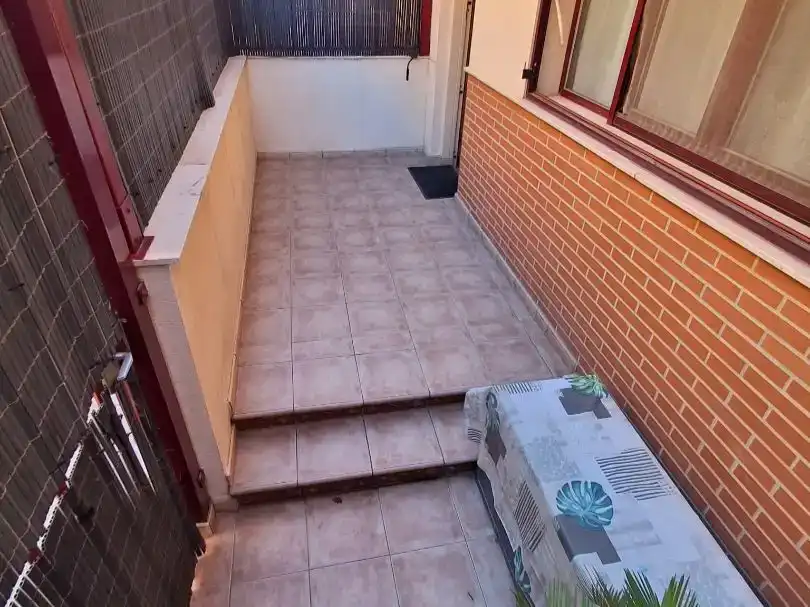 Terrassa de Casa adosada en venda en Sagunto / Sagunt amb Aire condicionat i Piscina