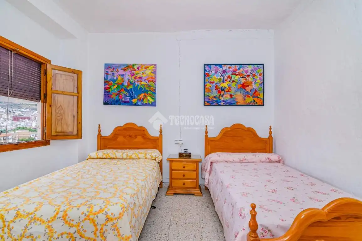 Dormitori de Casa adosada en venda en Loja amb Aire condicionat i Terrassa