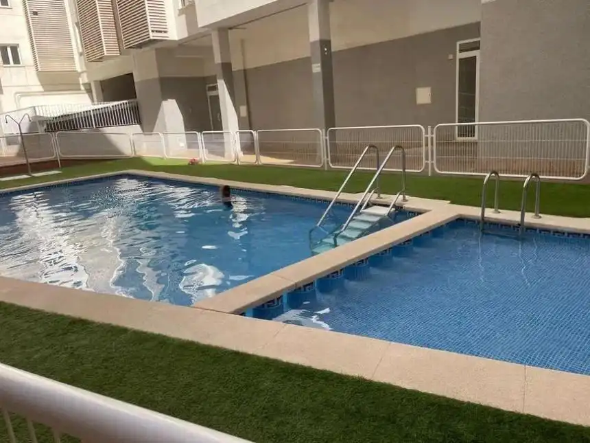 Swimming pool of Flat for sale in Alicante / Alacant  with Air Conditioner, Parquet flooring and Terrace