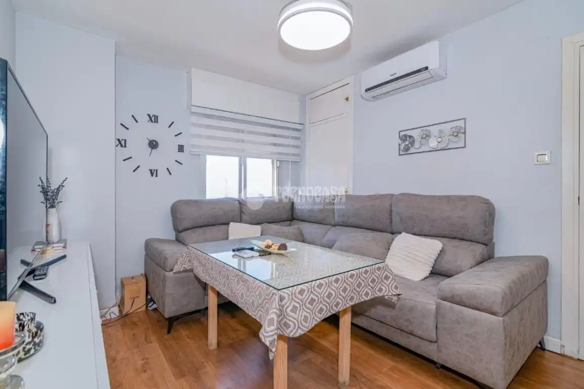 Sala d'estar de Pis en venda en Granada amb Aire condicionat