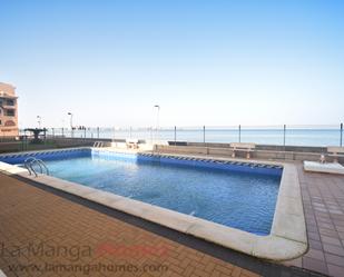 Piscina de Planta baixa en venda en La Manga del Mar Menor amb Terrassa, Moblat i Piscina comunitària