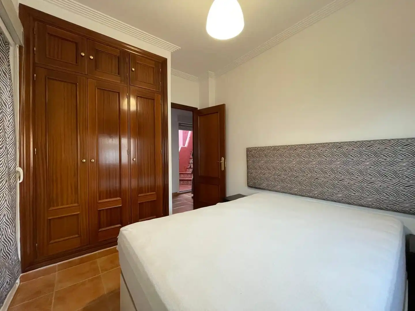 Habitación de Casa o chalet de alquiler en El Portil con Piscina comunitaria
