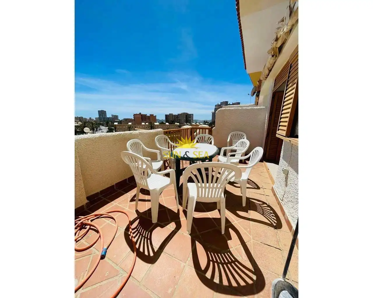 Terrassa de Casa adosada de lloguer en La Manga del Mar Menor amb Calefacció, Terrassa i Piscina