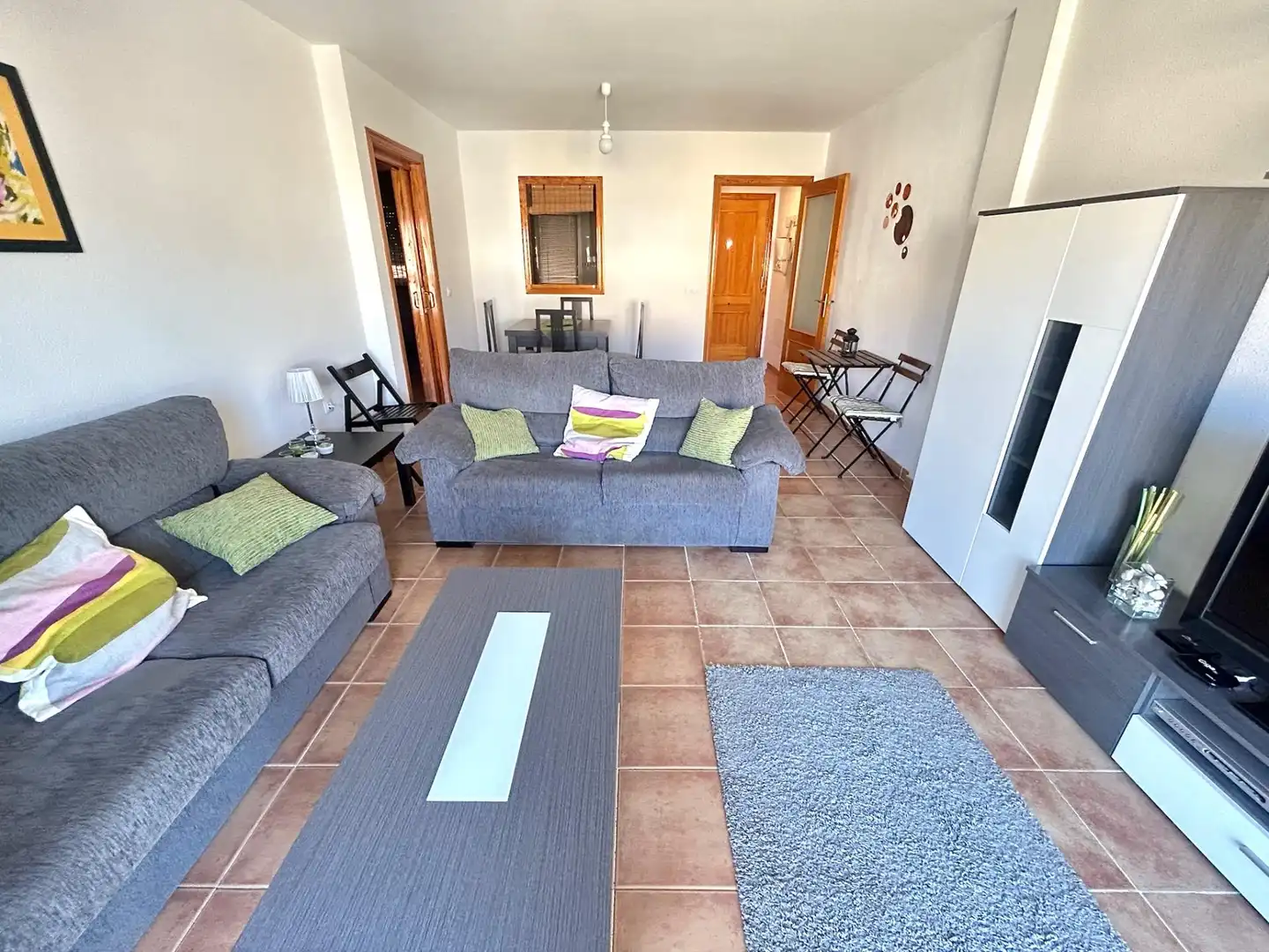 Sala de estar de Piso en venta en Roquetas de Mar con Terraza, Amueblado y Piscina comunitaria