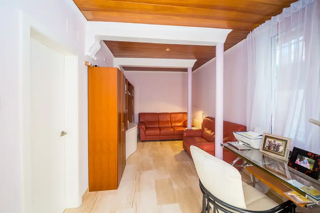Sala de estar de Casa adosada en venta en Castell d'Aro, Platja d'Aro i s'Agaró con Aire acondicionado, Calefacción y Jardín privado