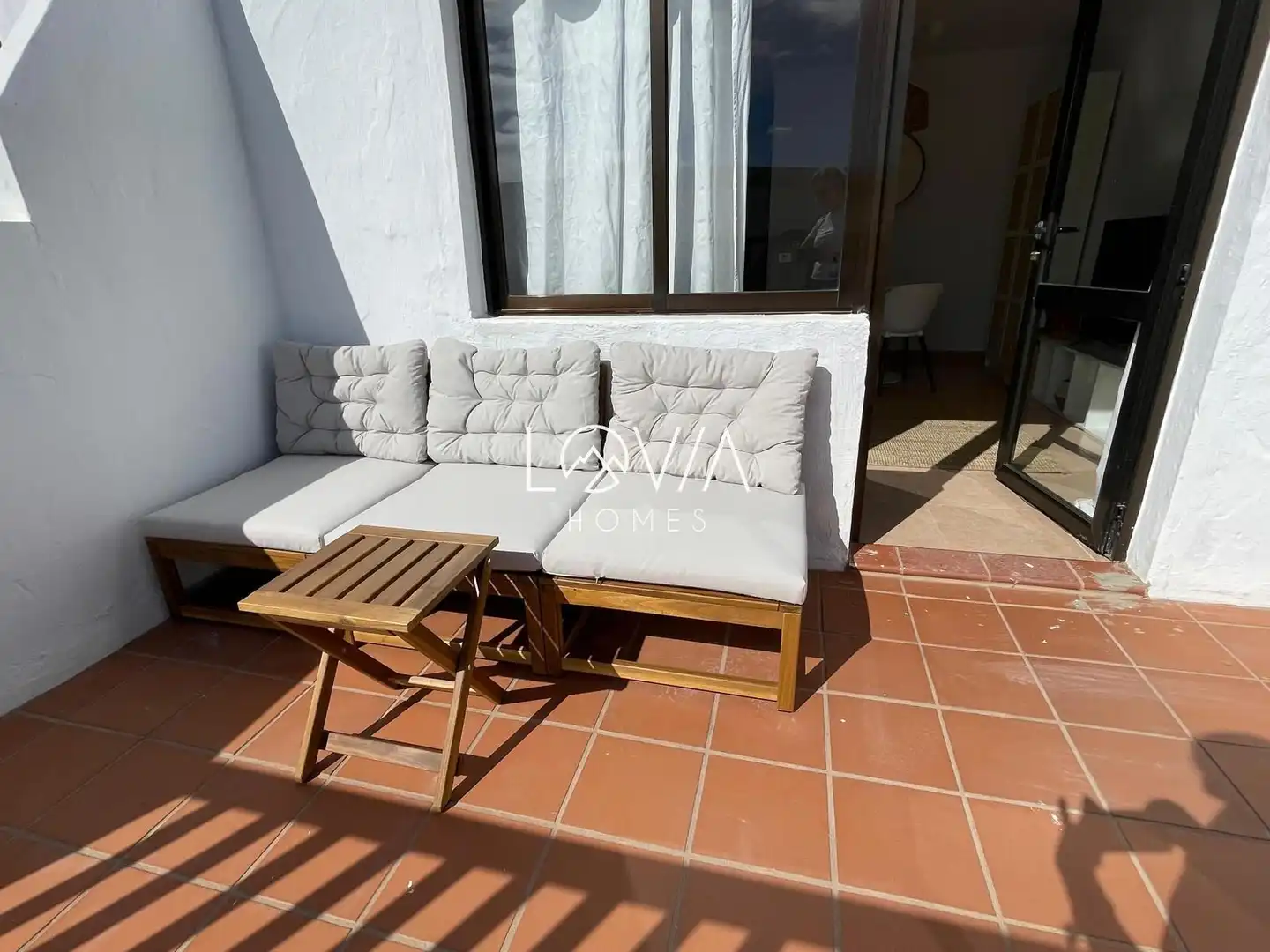 Terrassa de Apartament de lloguer en La Oliva amb Terrassa, Piscina i Piscina comunitària