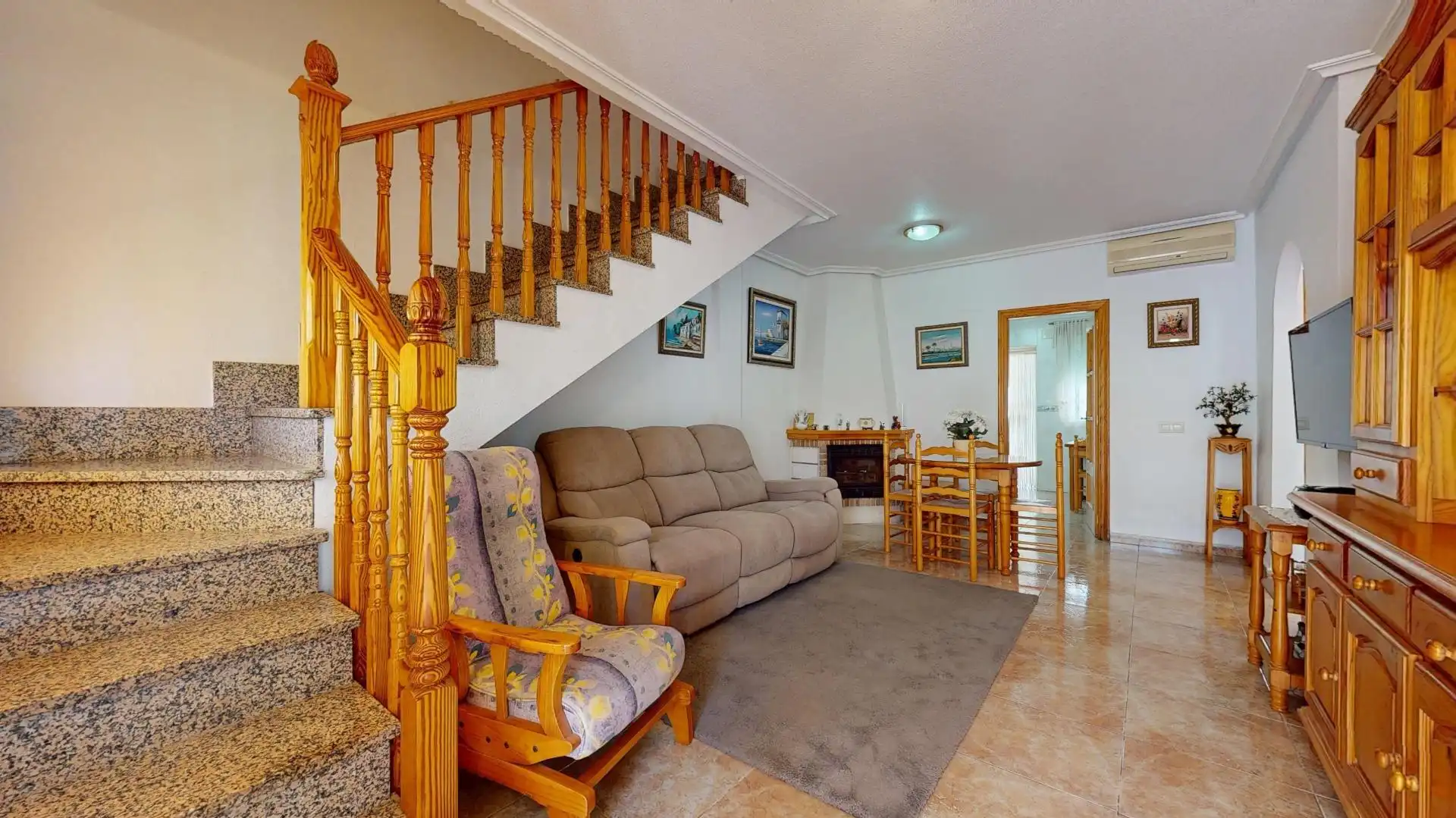 Sala de estar de Casa adosada en venta en Pilar de la Horadada con Aire acondicionado, Jardín privado y Terraza