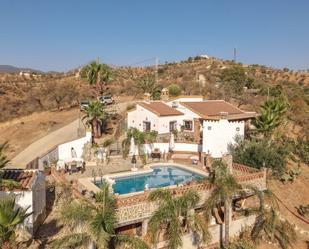 Exterior view of House or chalet for sale in Guaro  with Private garden and Swimming Pool