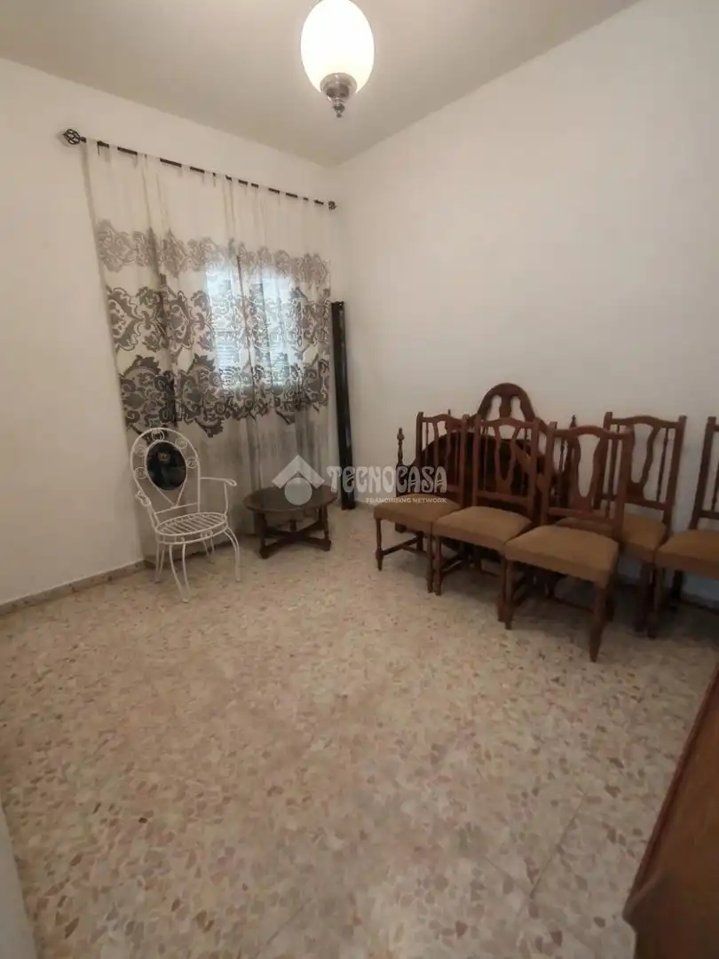 Sala d'estar de Casa adosada en venda en Marchena amb Aire condicionat