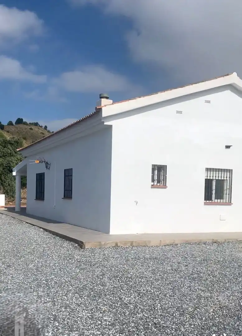 Vista exterior de Finca rústica en venda en El Borge amb Jardí privat, Terrassa i Traster