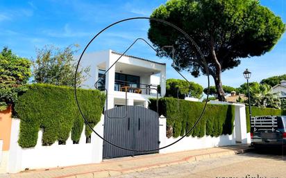 Vista exterior de Casa o xalet en venda en Aljaraque amb Aire condicionat, Jardí privat i Terrassa