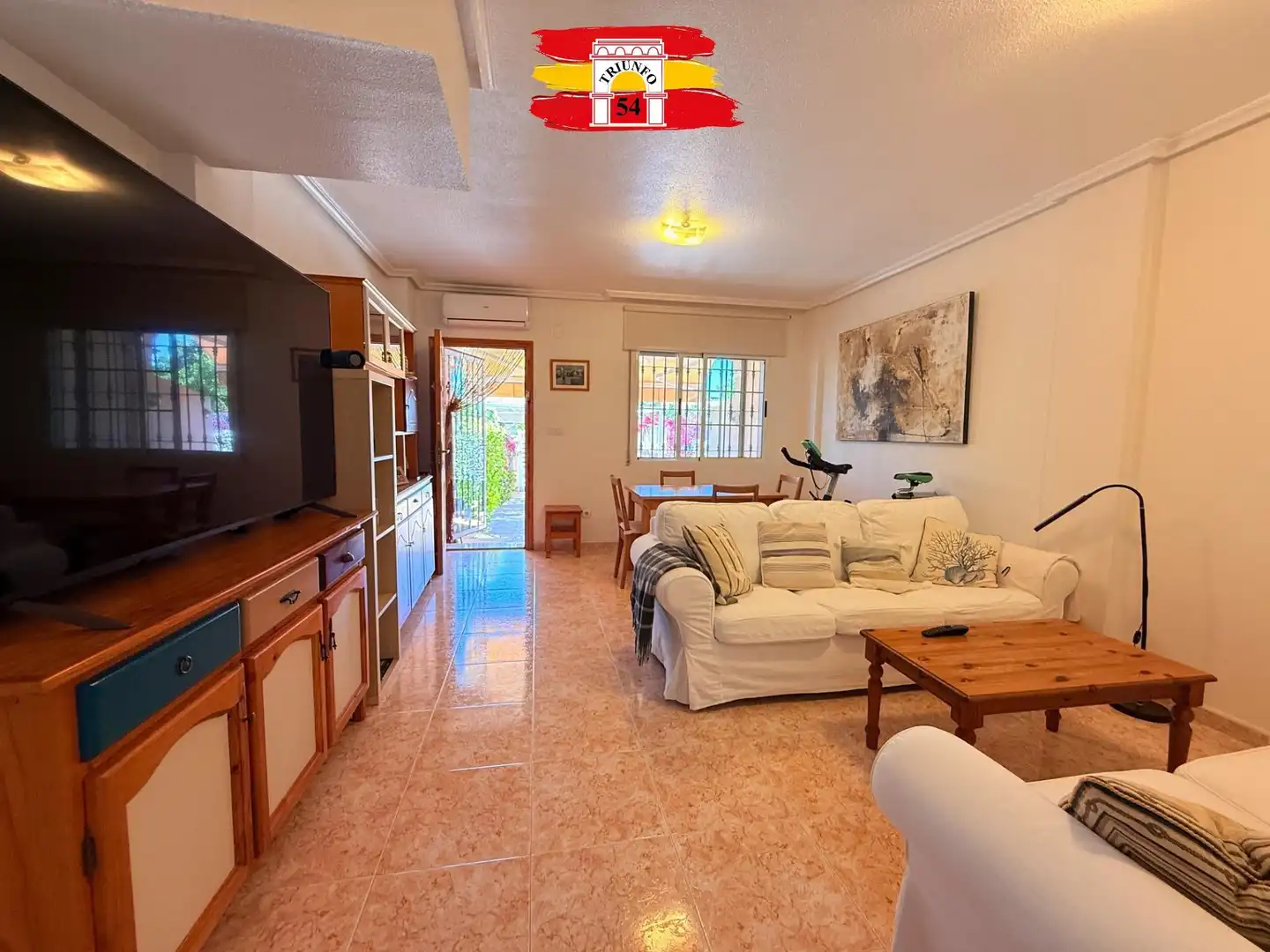 Sala de estar de Casa o chalet en venta en Pilar de la Horadada con Aire acondicionado, Jardín privado y Amueblado