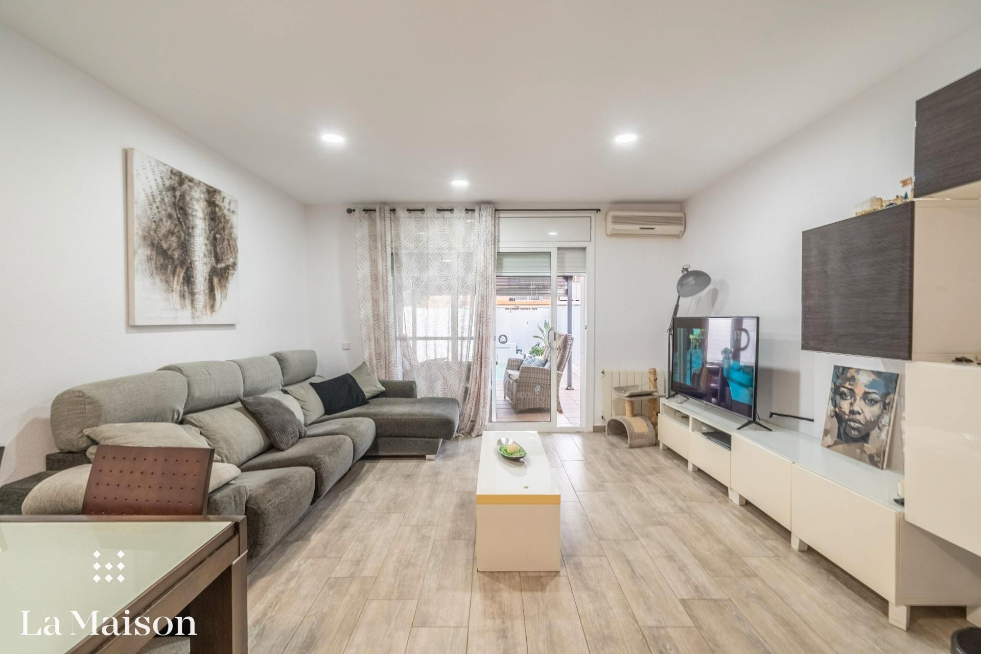 Sala d'estar de Casa adosada en venda en Palafolls amb Aire condicionat, Calefacció i Jardí privat