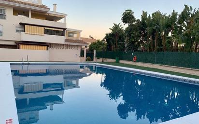 Swimming pool of Apartment to rent in Estepona  with Air Conditioner, Heating and Terrace