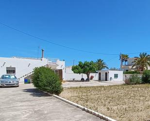 Exterior view of Single-family semi-detached for sale in Dénia  with Air Conditioner, Terrace and Swimming Pool