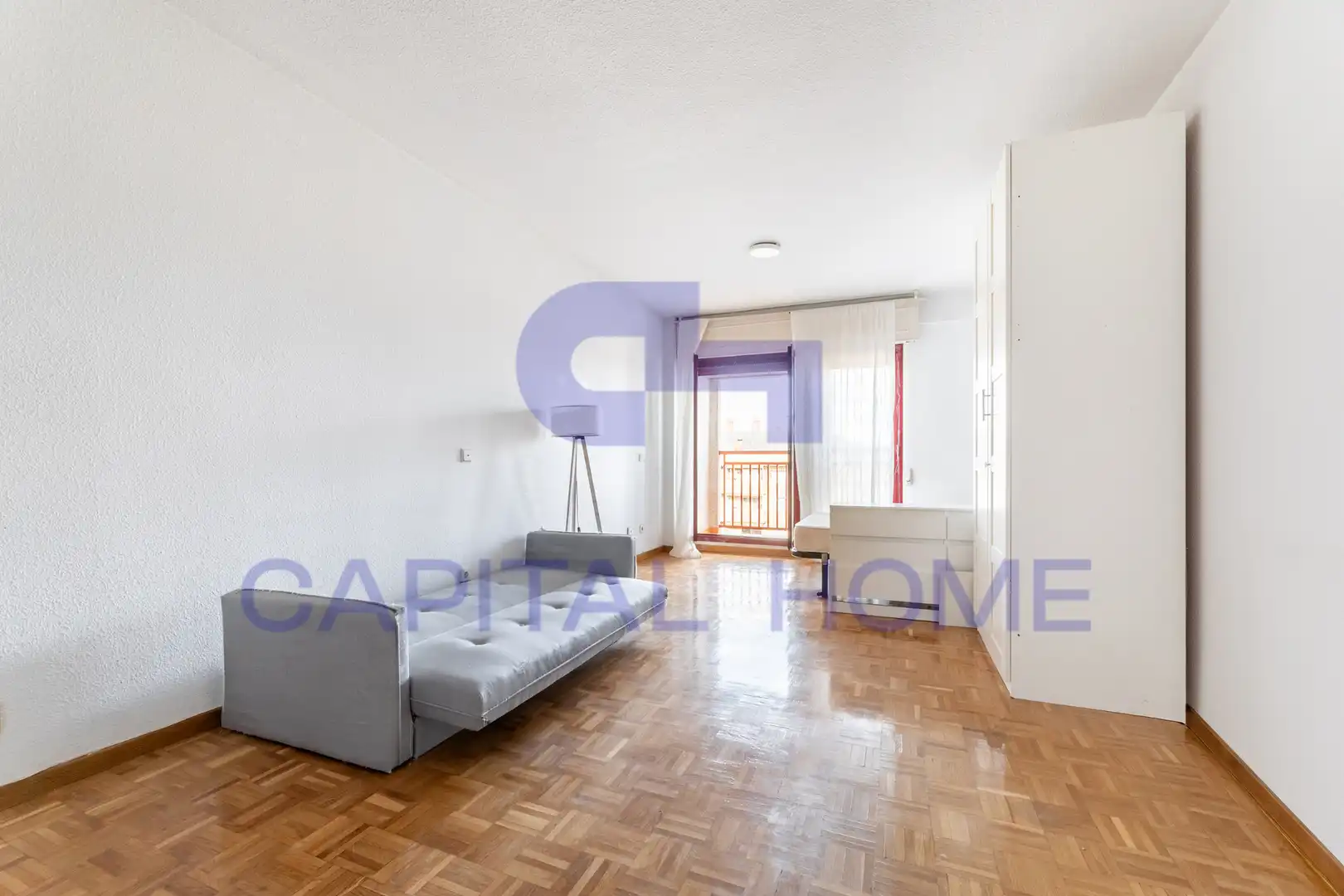 Sala de estar de Estudio en venta en Madrid con Parquet y Terraza