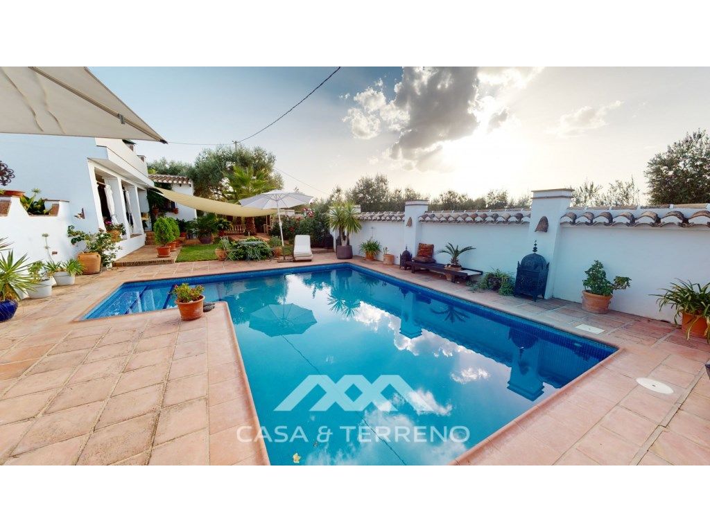 Exterior view of House or chalet for sale in Villanueva del Trabuco  with Air Conditioner, Private garden and Terrace