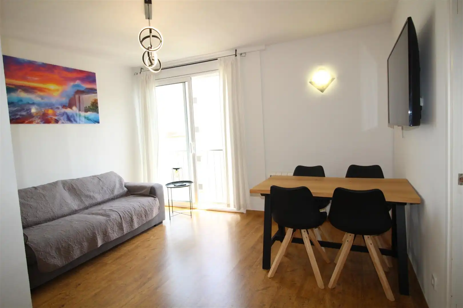 Sala d'estar de Apartament en venda en L'Escala amb Calefacció, Jardí privat i Parquet
