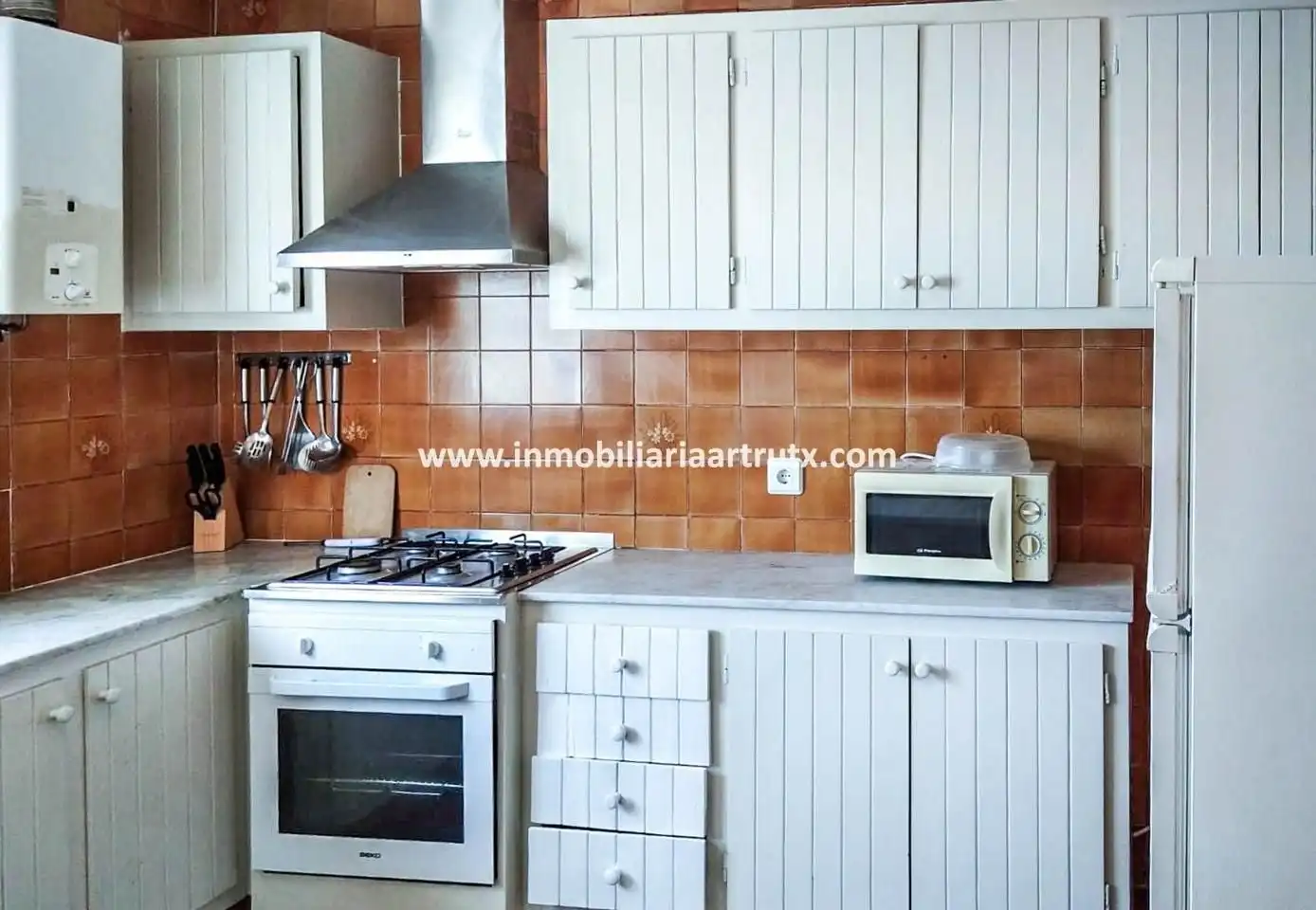 Cuina de Casa o xalet en venda en Ciutadella de Menorca amb Aire condicionat, Jardí privat i Terrassa