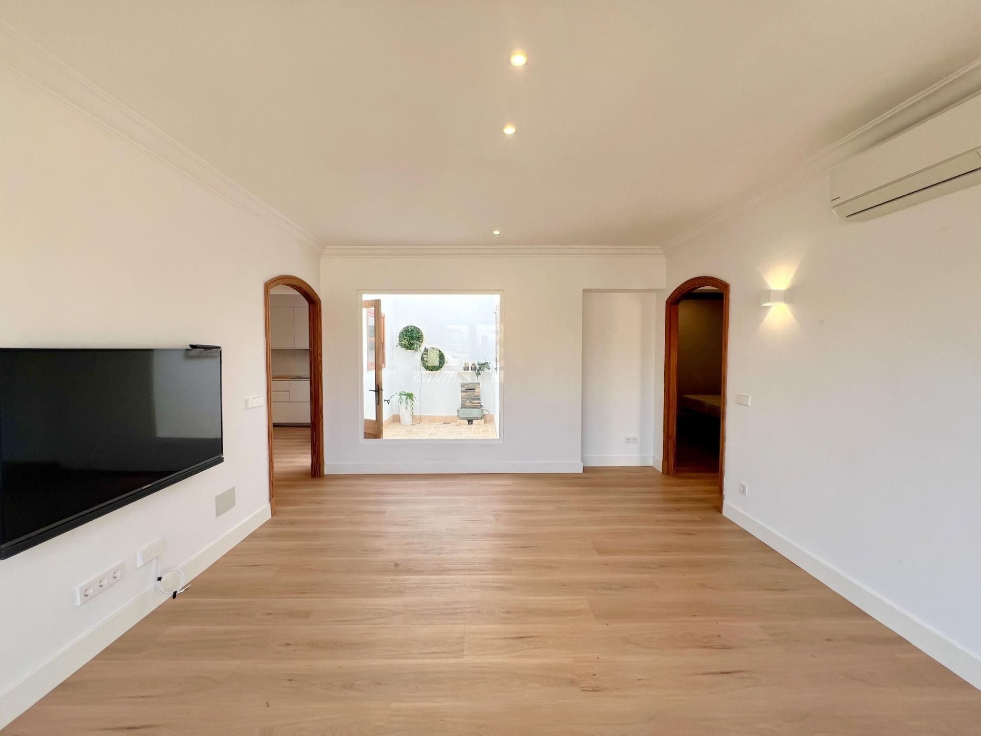 Sala de estar de Apartamento de alquiler en Santanyí con Aire acondicionado, Jardín privado y Parquet