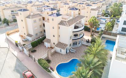 Exterior view of Planta baja for sale in Orihuela  with Air Conditioner, Swimming Pool and Balcony