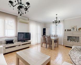 Living room of Single-family semi-detached for sale in Puçol  with Air Conditioner and Balcony