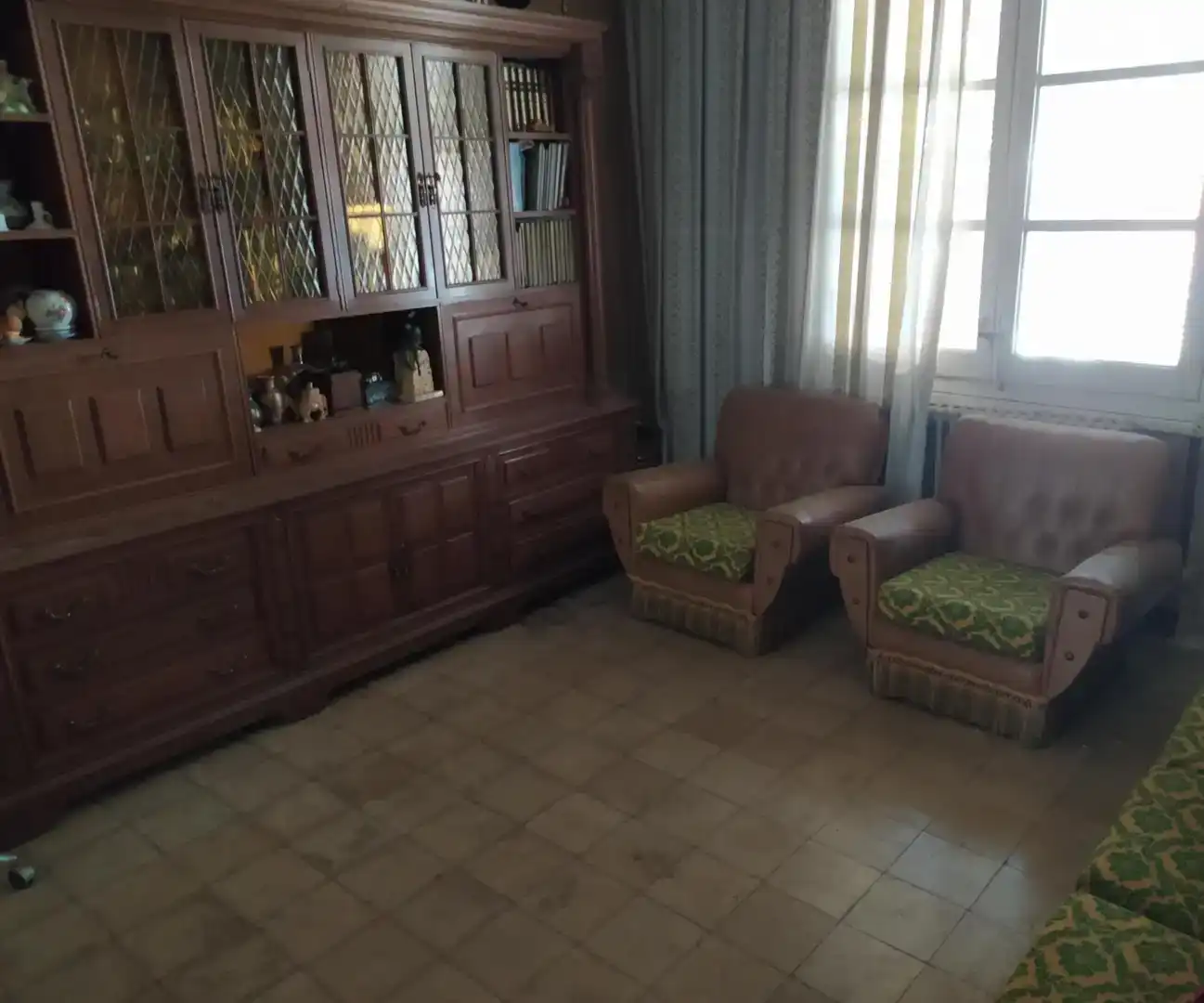 Sala d'estar de Casa adosada en venda en Barbastro