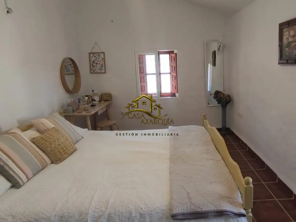 Dormitori de Finca rústica de lloguer en Benamargosa amb Moblat