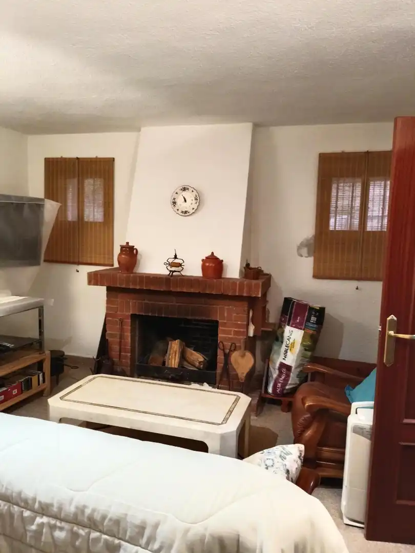 Sala de estar de Casa adosada en venta en La Lastrilla  con Aire acondicionado, Calefacción y Jardín privado