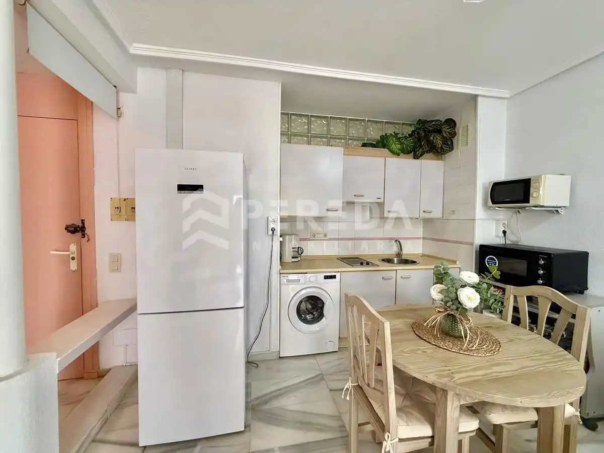 Cocina de Apartamento en venta en Roquetas de Mar con Aire acondicionado, Terraza y Amueblado