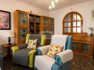 Sala de estar de Casa adosada en venta en Vegas del Genil con Aire acondicionado, Calefacción y Jardín privado