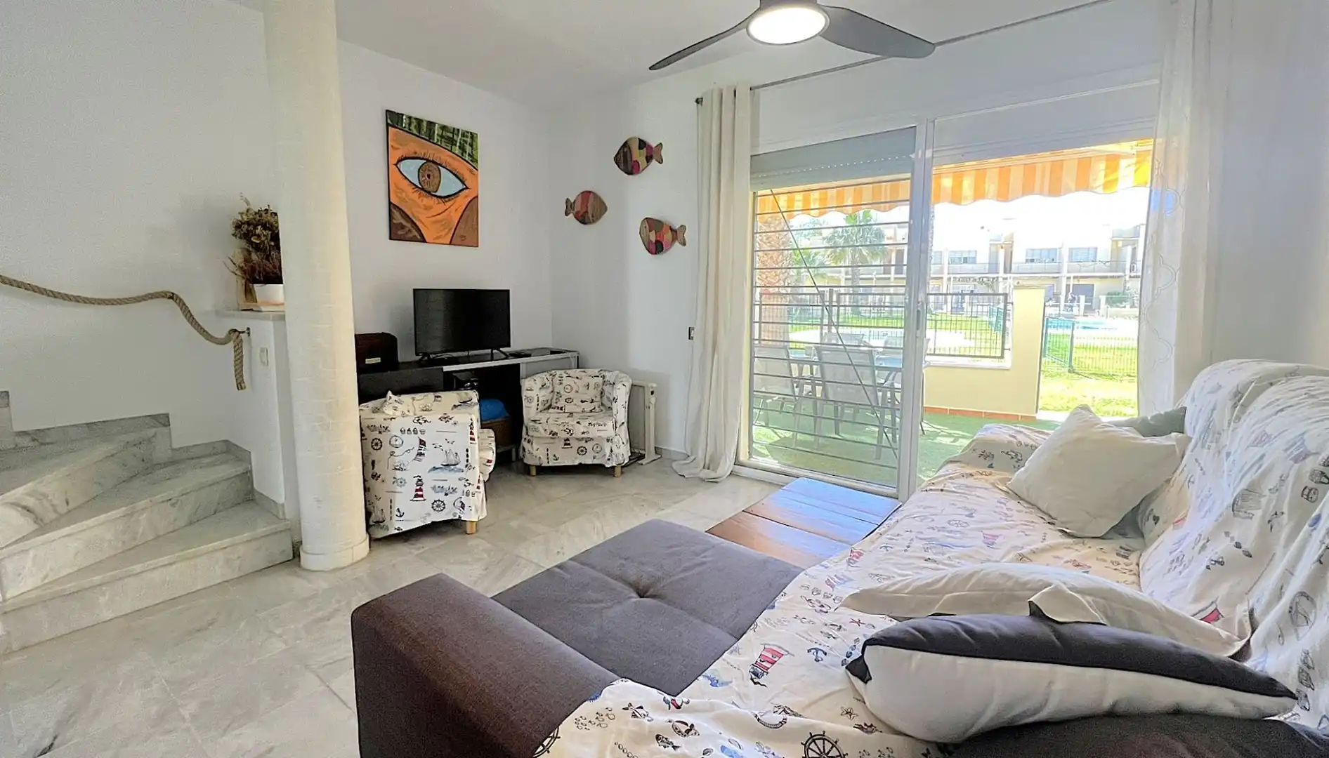 Sala d'estar de Casa adosada en venda en Isla Cristina amb Aire condicionat, Calefacció i Terrassa