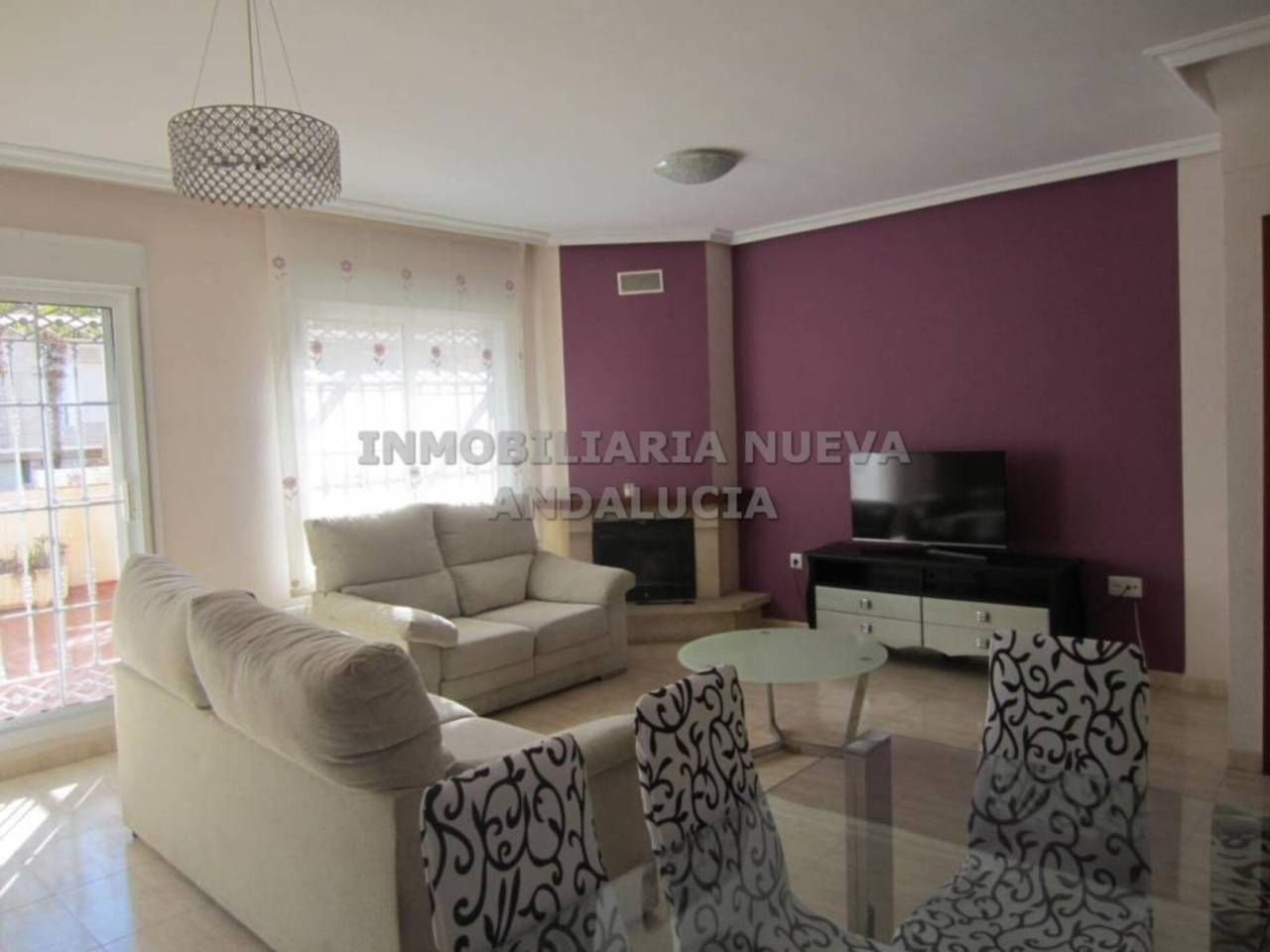 Sala d'estar de Casa o xalet de lloguer en  Almería Capital amb Aire condicionat, Terrassa i Moblat