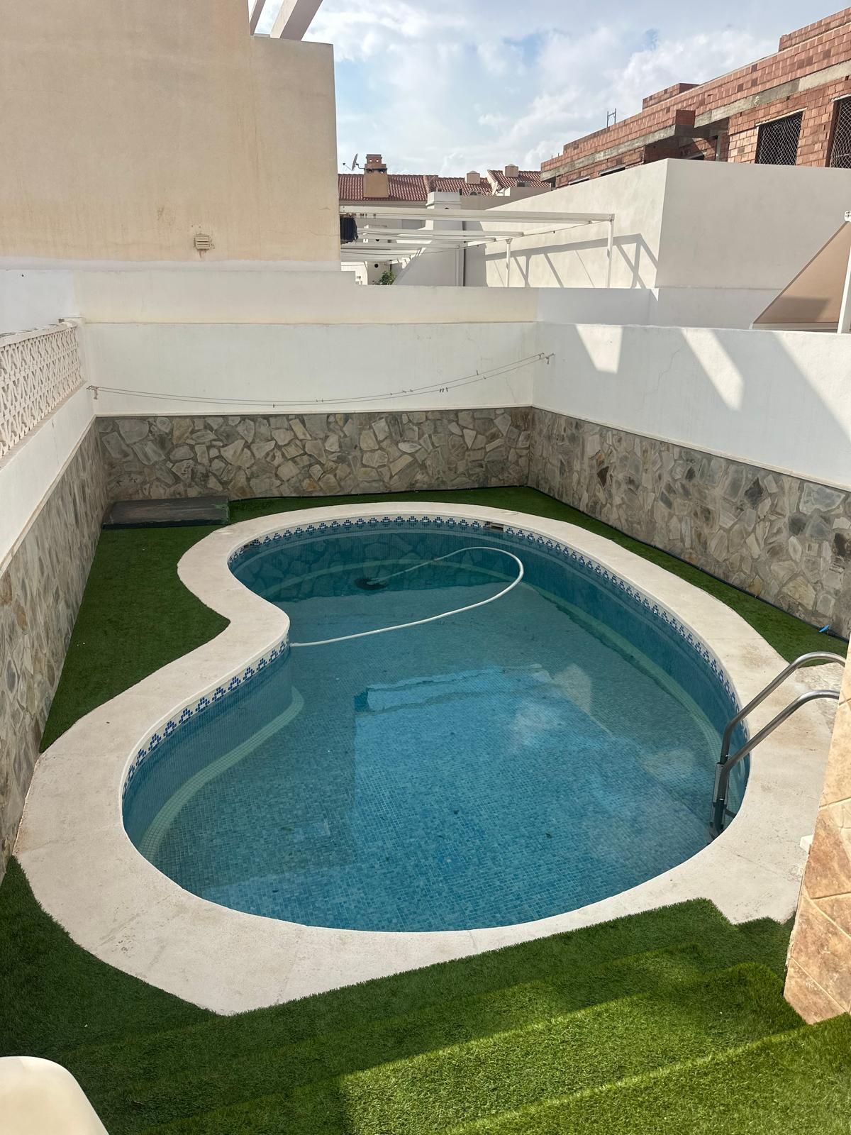 Swimming pool of House or chalet for sale in Roquetas de Mar  with Air Conditioner and Swimming Pool