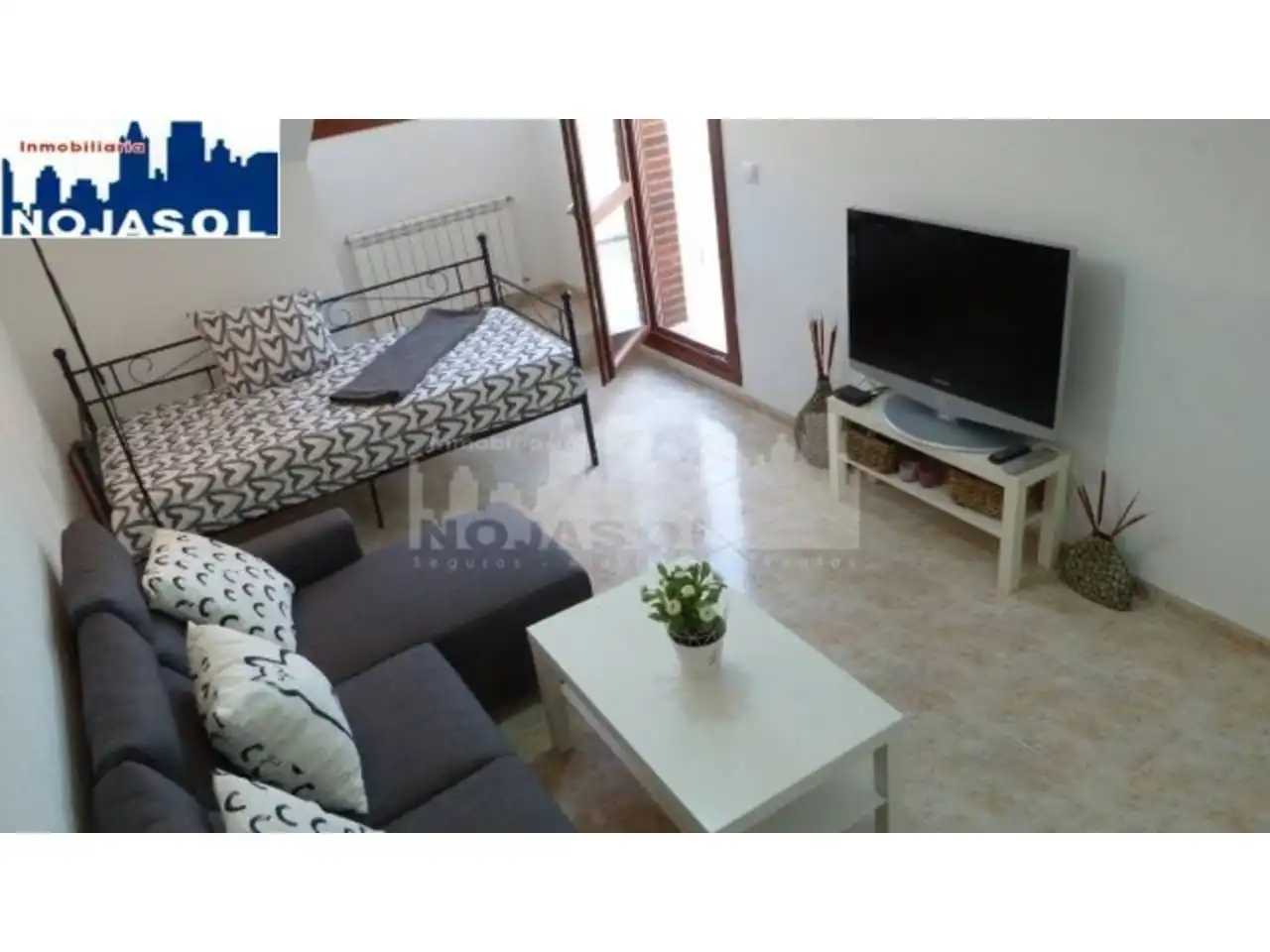 Sala d'estar de Àtic de lloguer en Noja amb Calefacció, Terrassa i Moblat