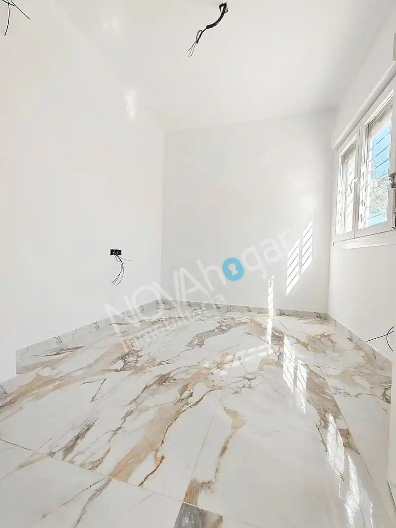 Habitación de Casa adosada en venta en Málaga
