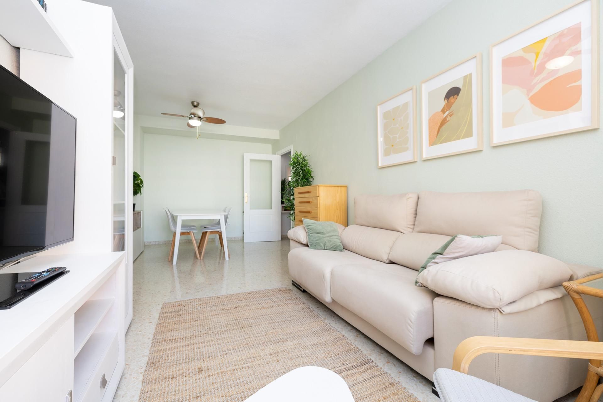 Living room of Flat for sale in  Granada Capital  with Heating, Terrace and Community pool