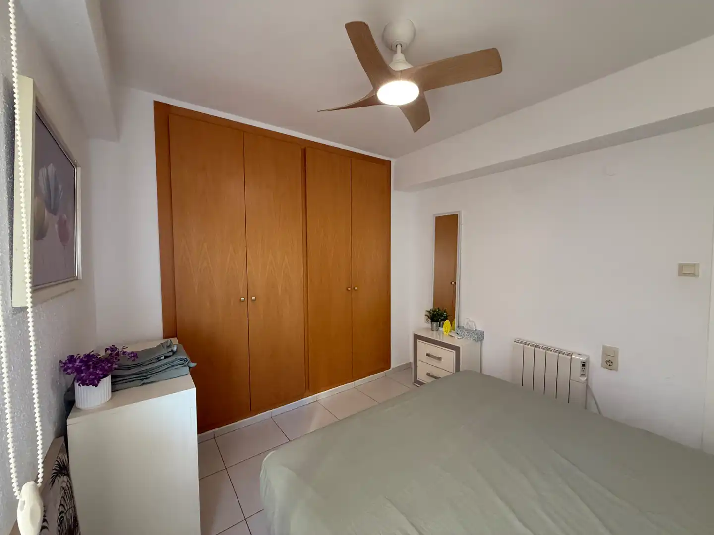 Dormitori de Apartament de lloguer en Dénia amb Calefacció, Terrassa i Traster