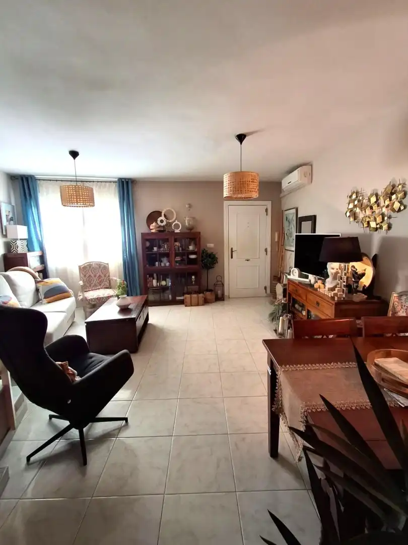 Sala de estar de Casa adosada en venta en Málaga con Aire acondicionado y Balcón