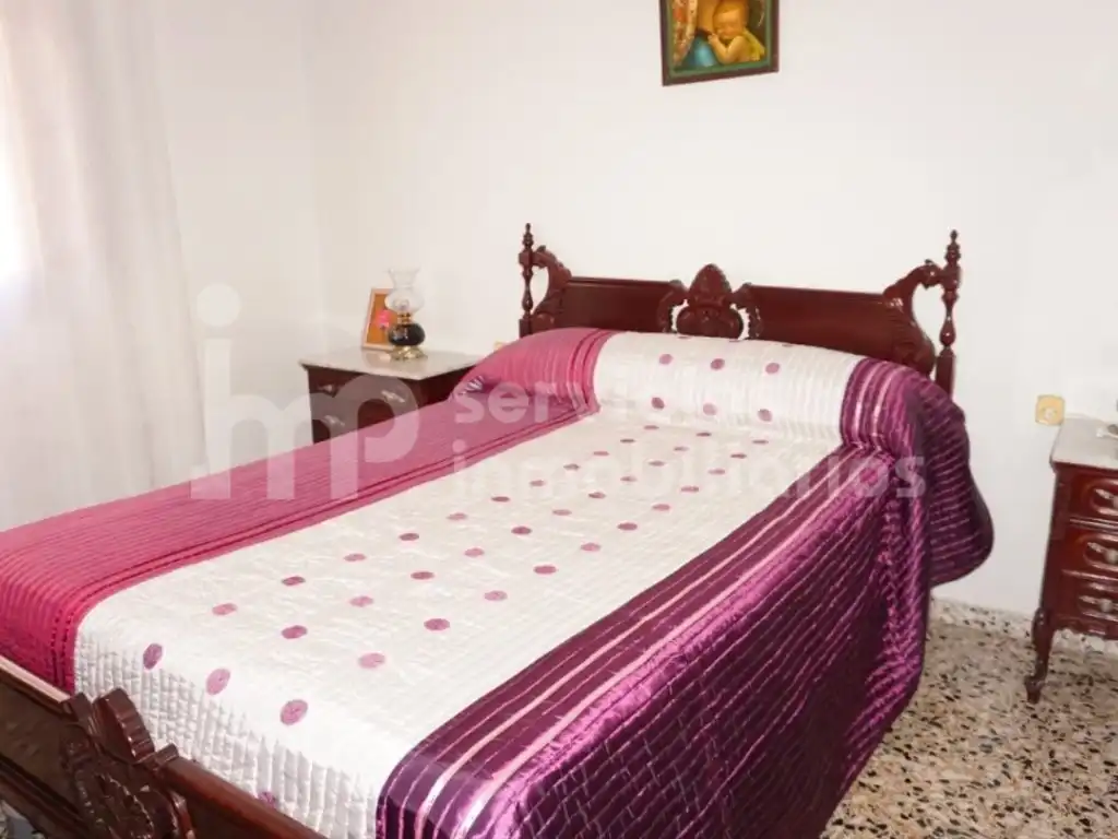 Habitación de Casa adosada en venta en Benamocarra con Jardín privado, Terraza y Amueblado