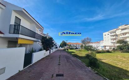 Vista exterior de Casa adosada en venda en Almonte amb Terrassa, Traster i Balcó