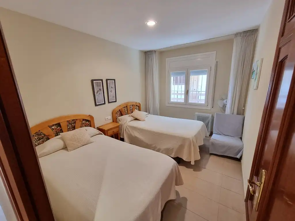 Schlafzimmer von Wohnungen zum Verkauf in Cambrils mit Klimaanlage, Privatgarten und Terrasse