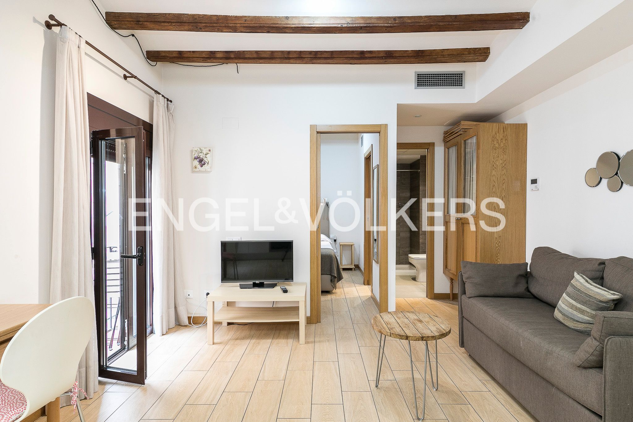 Sala d'estar de Apartament de lloguer en  Barcelona Capital amb Aire condicionat, Calefacció i Parquet