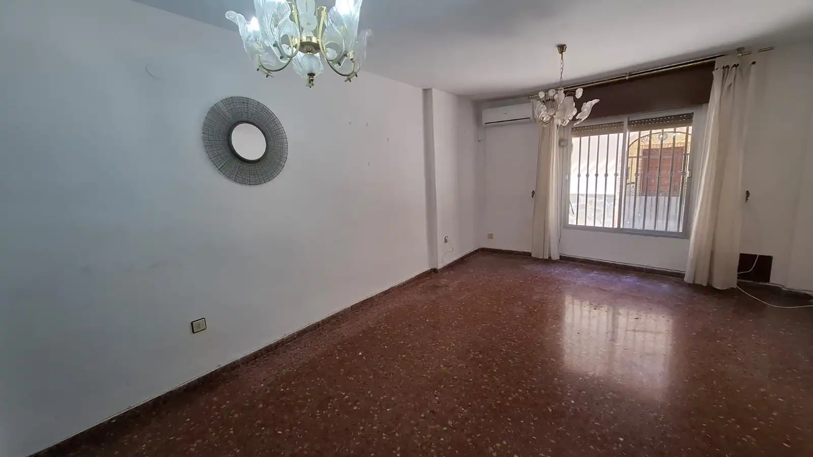 Sala d'estar de Casa adosada en venda en Motril amb Aire condicionat i Alarma