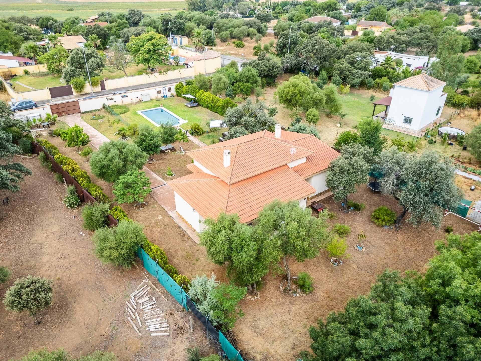 Exterior view of House or chalet for sale in Sanlúcar la Mayor  with Air Conditioner, Heating and Private garden